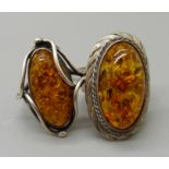 Two silver and amber rings, K and S