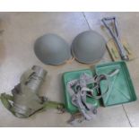 A collection of East German militaria including a trenching tool