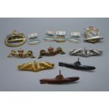 A collection of Russian badges including tin submarines