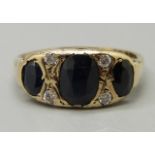 A 9ct gold, sapphire and white zircon ring, 2.4g, N