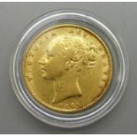 A Victorian 1860 shield back full sovereign