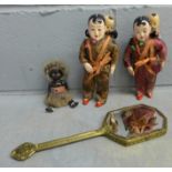 An oriental hand mirror, two 1950's oriental dolls, mothers with babies in traditional costume and a