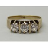 A 9ct gold, three stone ring, 2.2g, K