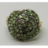 A silver gilt and green stone cluster ring, Q