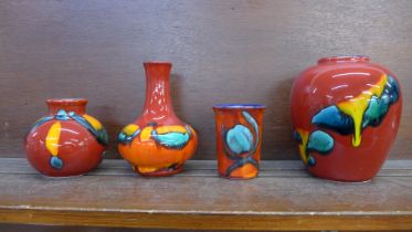 Four Poole vases, tallest 15.5cm