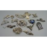 A collection of brooches