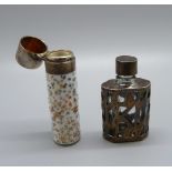 A porcelain scent bottle with a white metal top, (top dented) and another silver and glass perfume