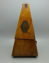 A Maelzel metronome, cover chipped