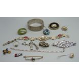 A collection of silver and other jewellery including a mourning brooch, a hardstone brooch, filigree
