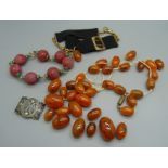 A bead bracelet, other beads for re-stringing and an Albertina