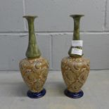 A pair of Royal Doulton white, gold and blue enamel metal vases, necks a/f **PLEASE NOTE THIS LOT IS