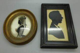 A Regency silhouette on convex glass and one other framed silhouette, oval frame 12.5cm wide