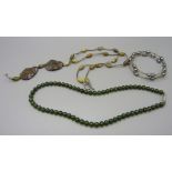 A silver hardstone necklace, a silver and pearl bracelet and a jade necklace