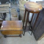 An oak jardiniere stand and a small drop leaf table