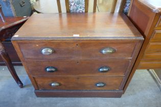 An early 20th century oak chest of drawers