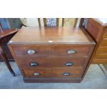 An early 20th century oak chest of drawers