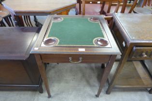 An Edward VII inlaid mahogany single drawer games table