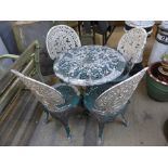 An aluminium garden table and four chairs