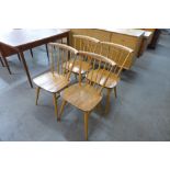 A set four Ercol 737 model chairs and a beech refectory table