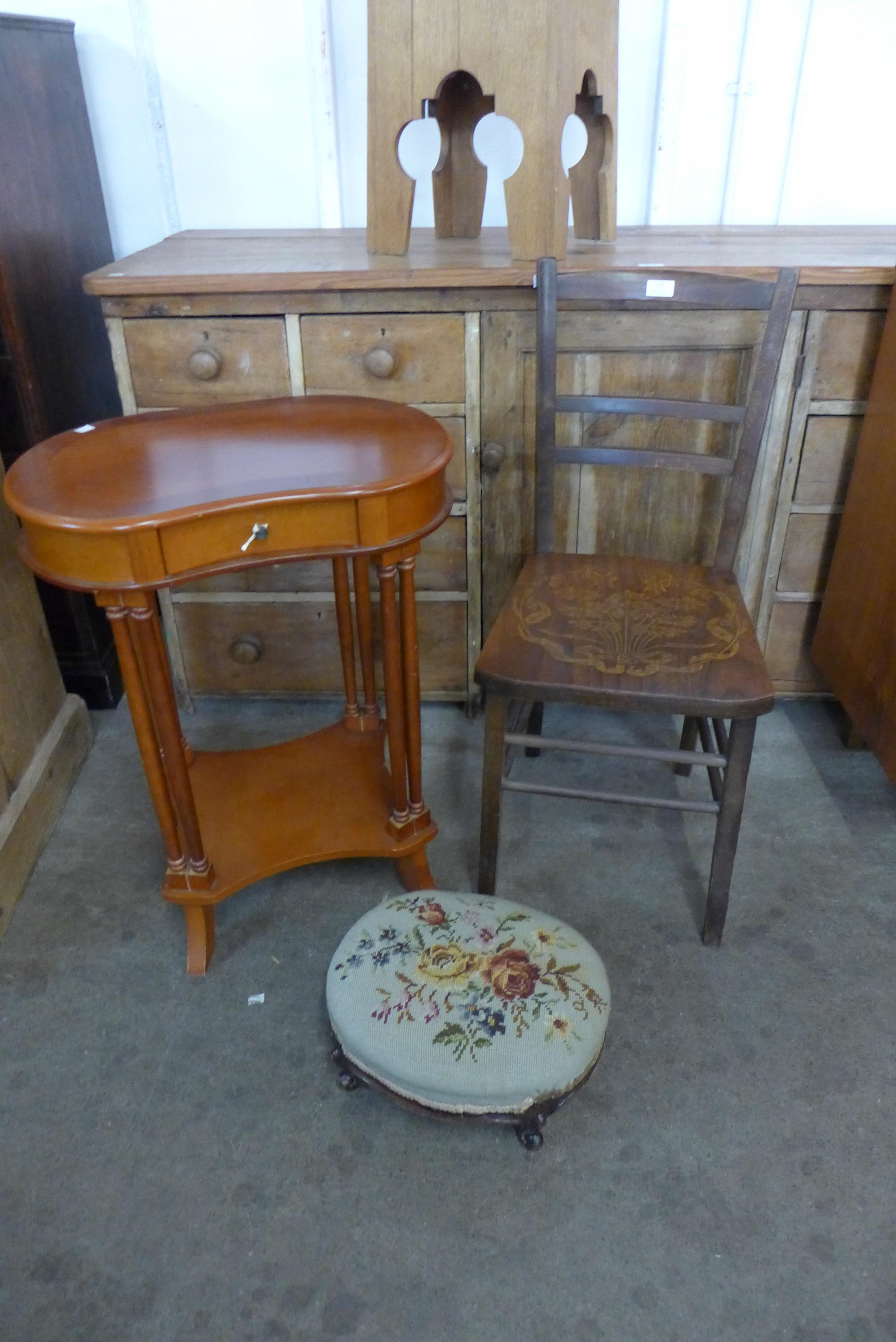 A carved beech chair, Victorian footstool and a kidney shaped side table