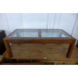 A G-Plan teak and glass topped coffee table