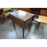 A George IV mahogany drop leaf three drawer night stand