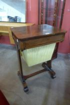 A Victorian rosewood sewing table