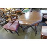 A Victorian mahogany octagonal centre table and four dining chairs