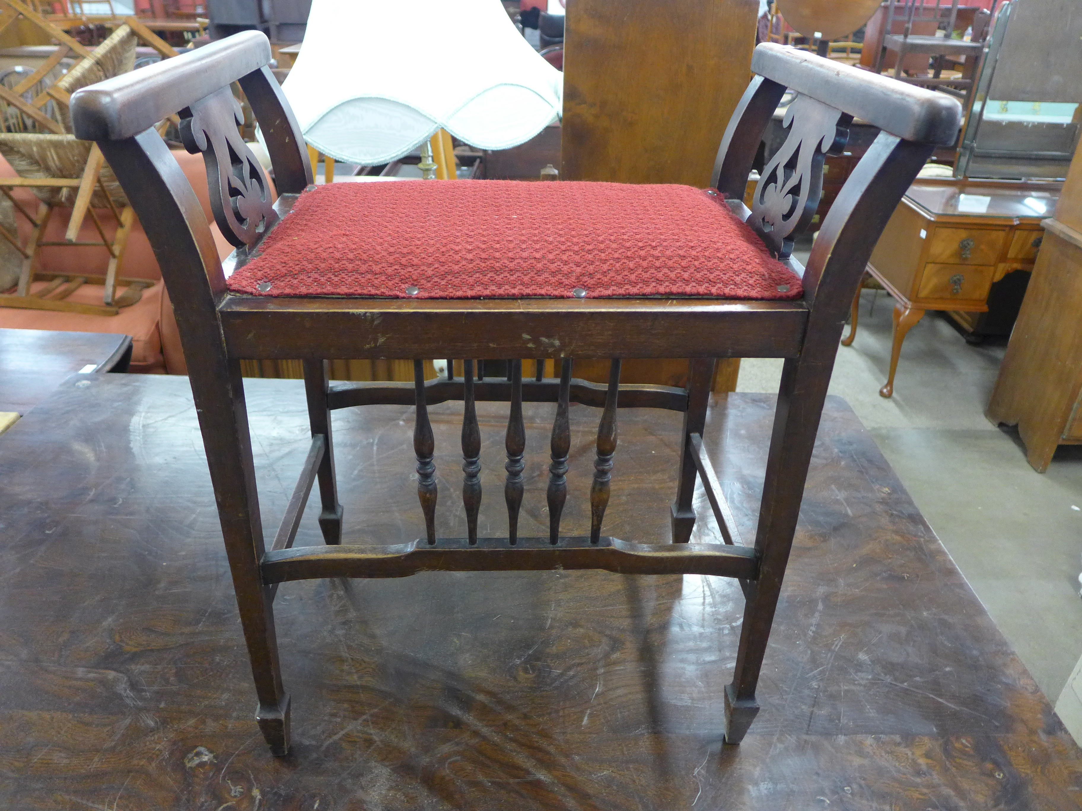 An Edward VII mahogany piano stool