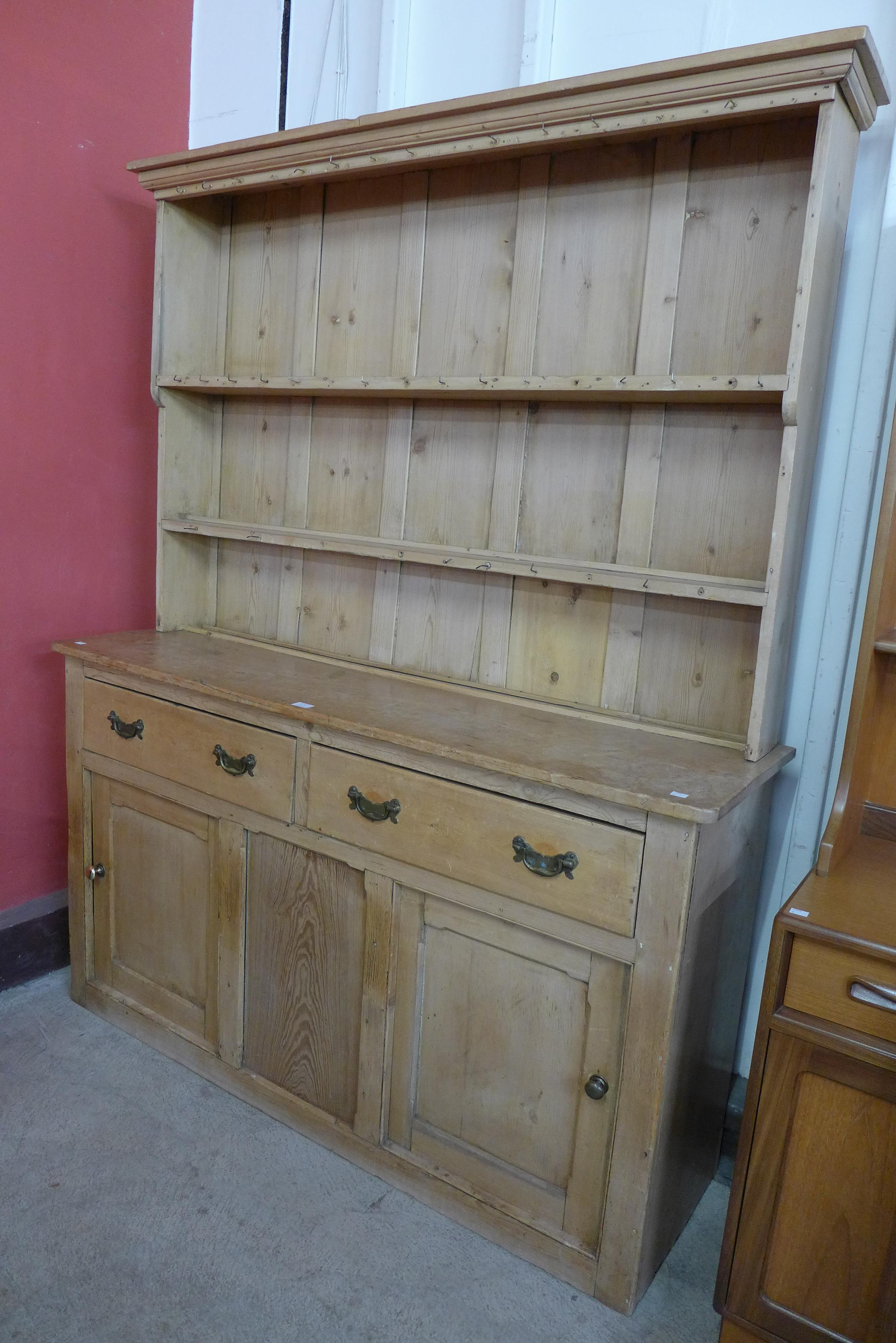 A Victorian pine waxed pine dresser