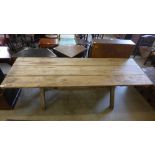 A Gothic pine x-frame farmhouse refectory table