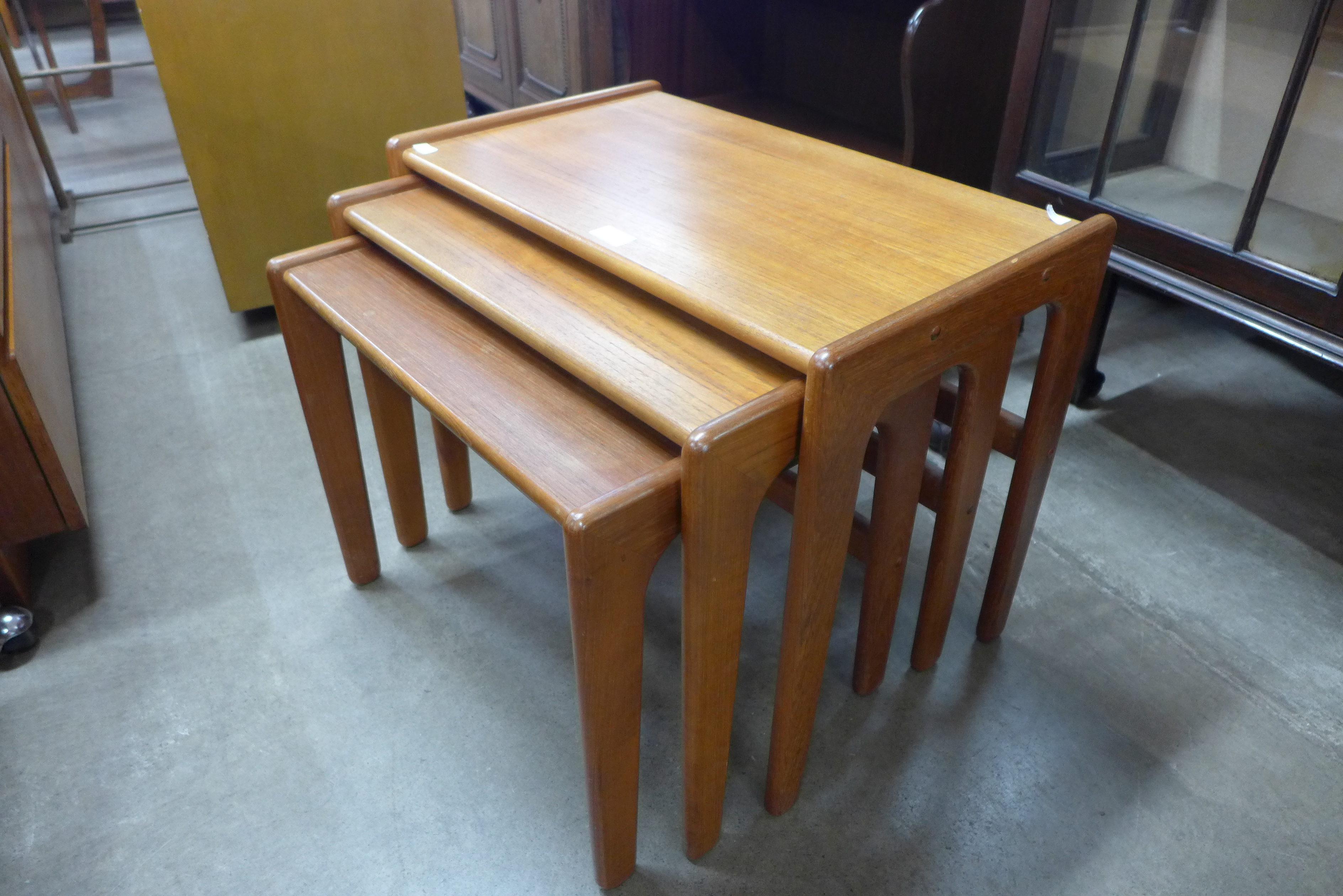 A Danish teak nest of tables