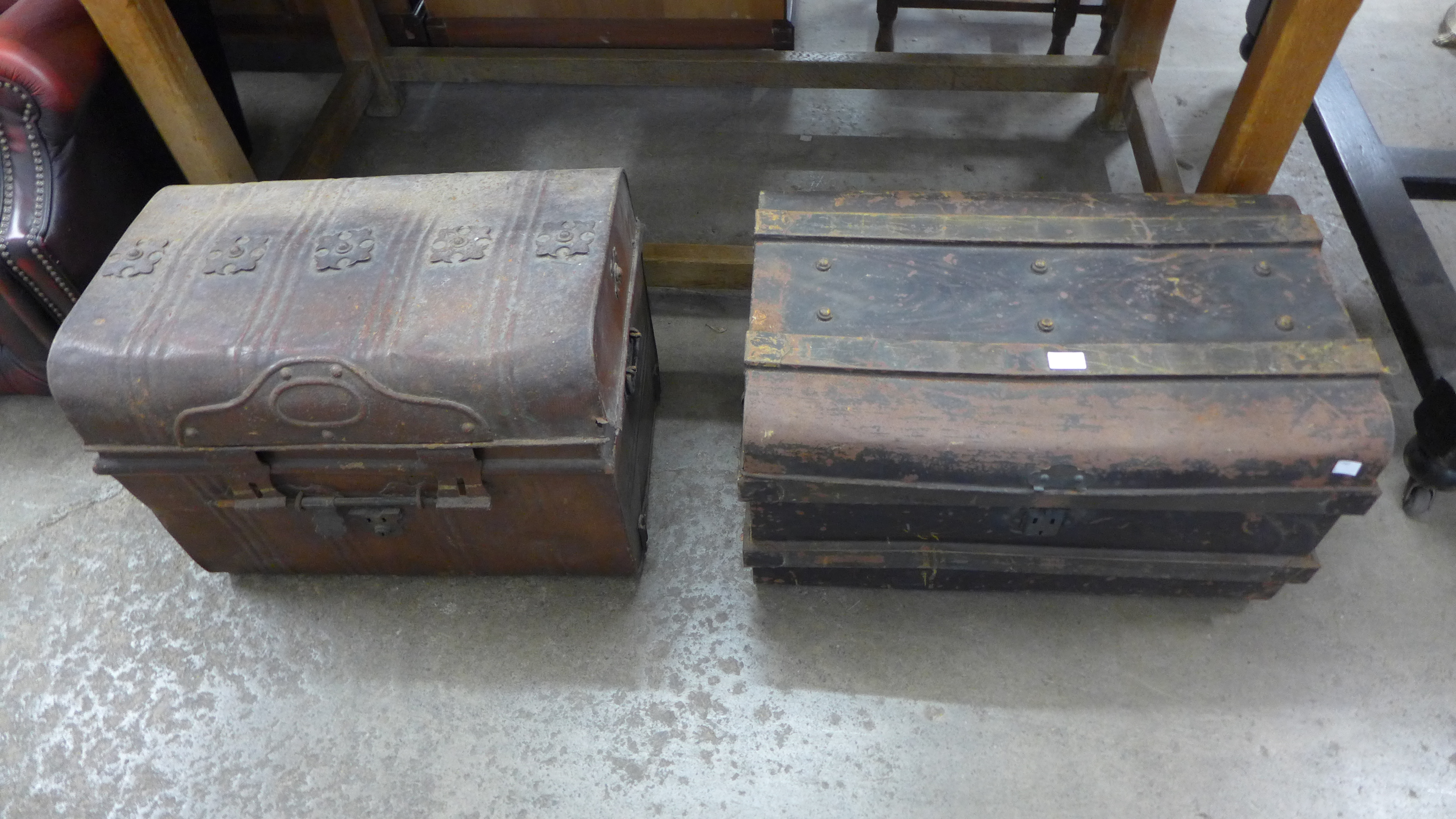 Two tin trunks