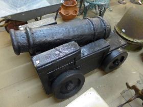 A painted wooden and plaster of Paris cannon