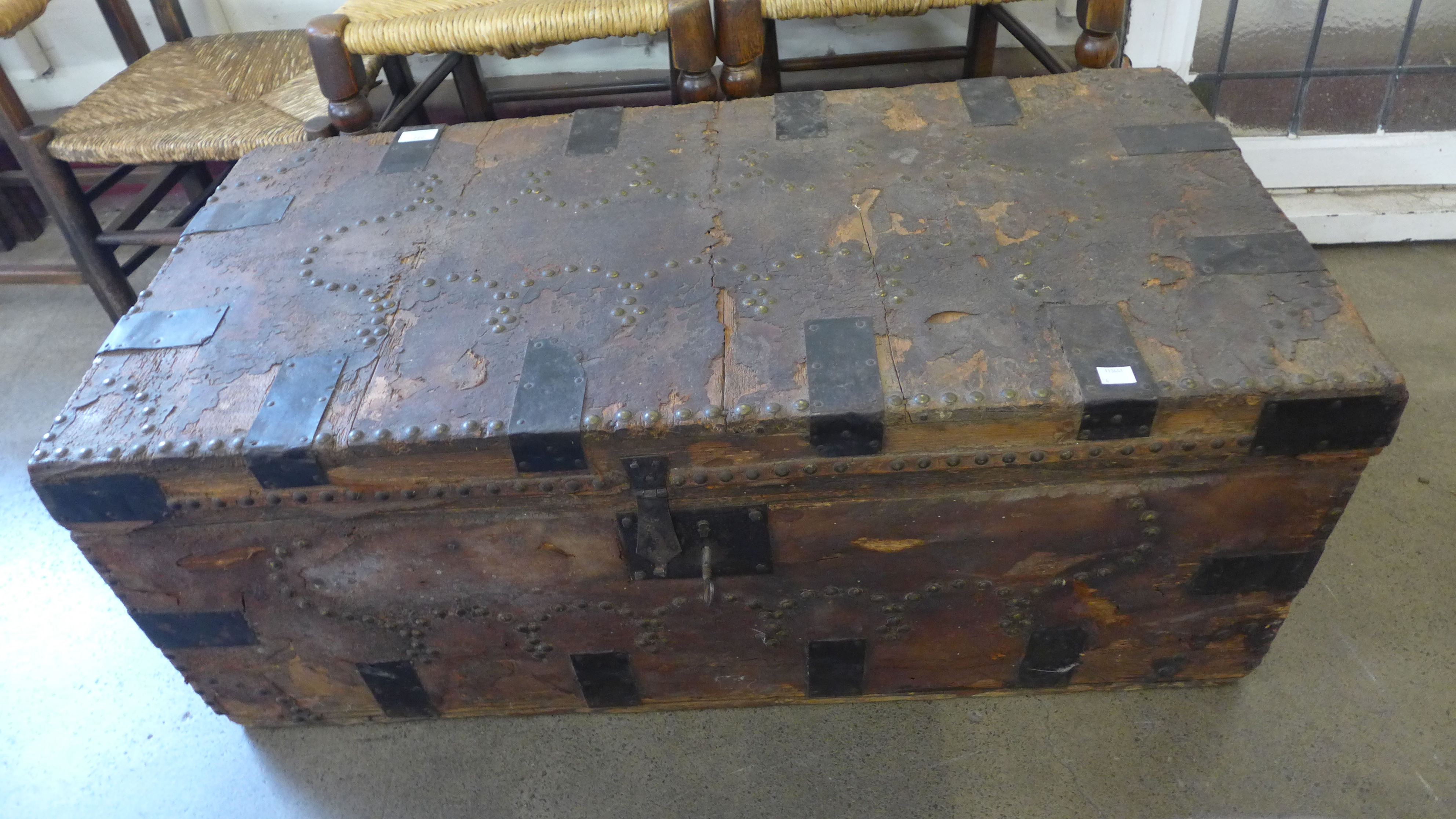 A 19th Century leather and iron bound steamer trunk
