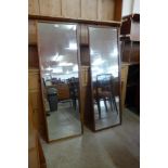 A pair of G- Plan teak framed mirrors