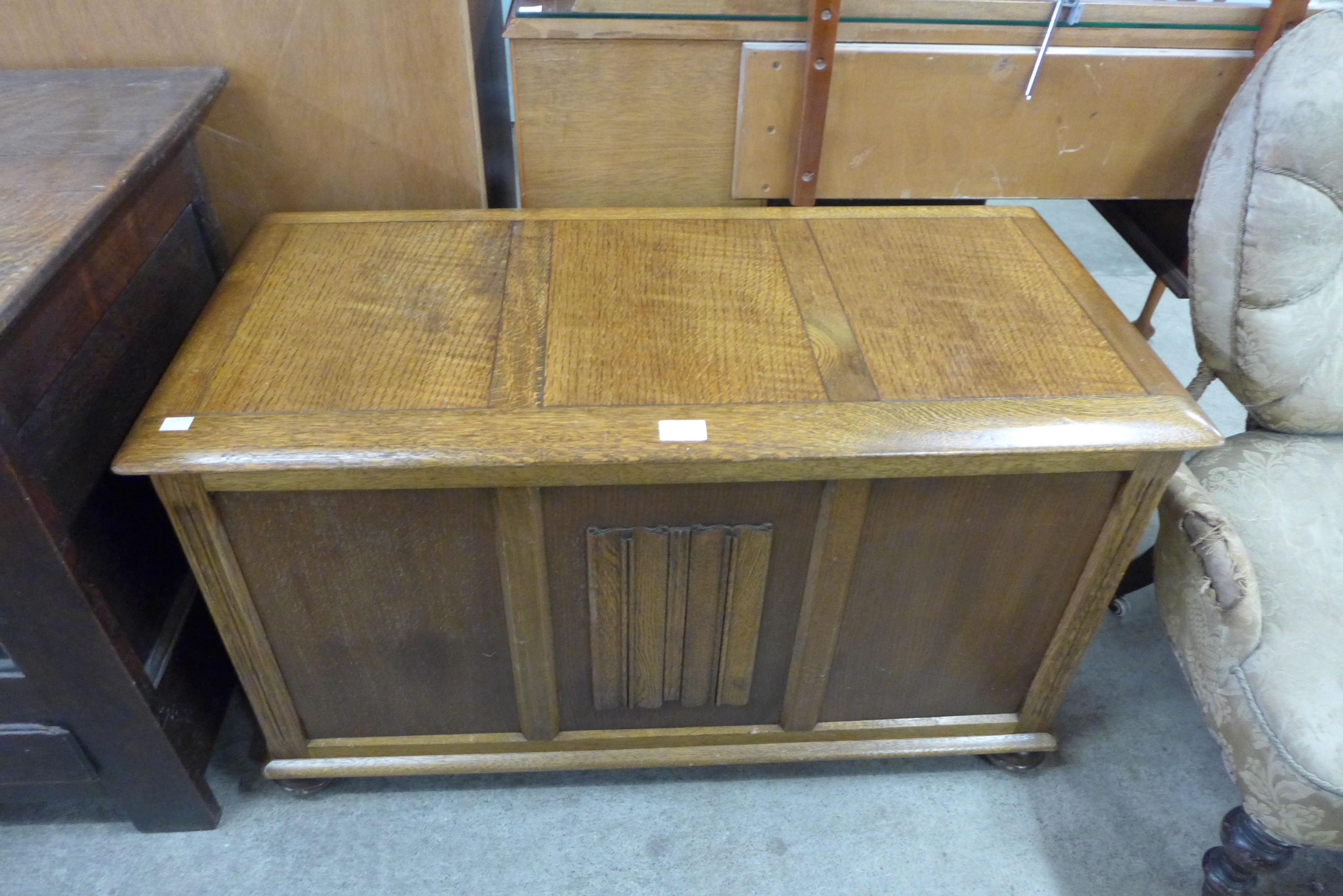 An oak linenfold panel blanket chest