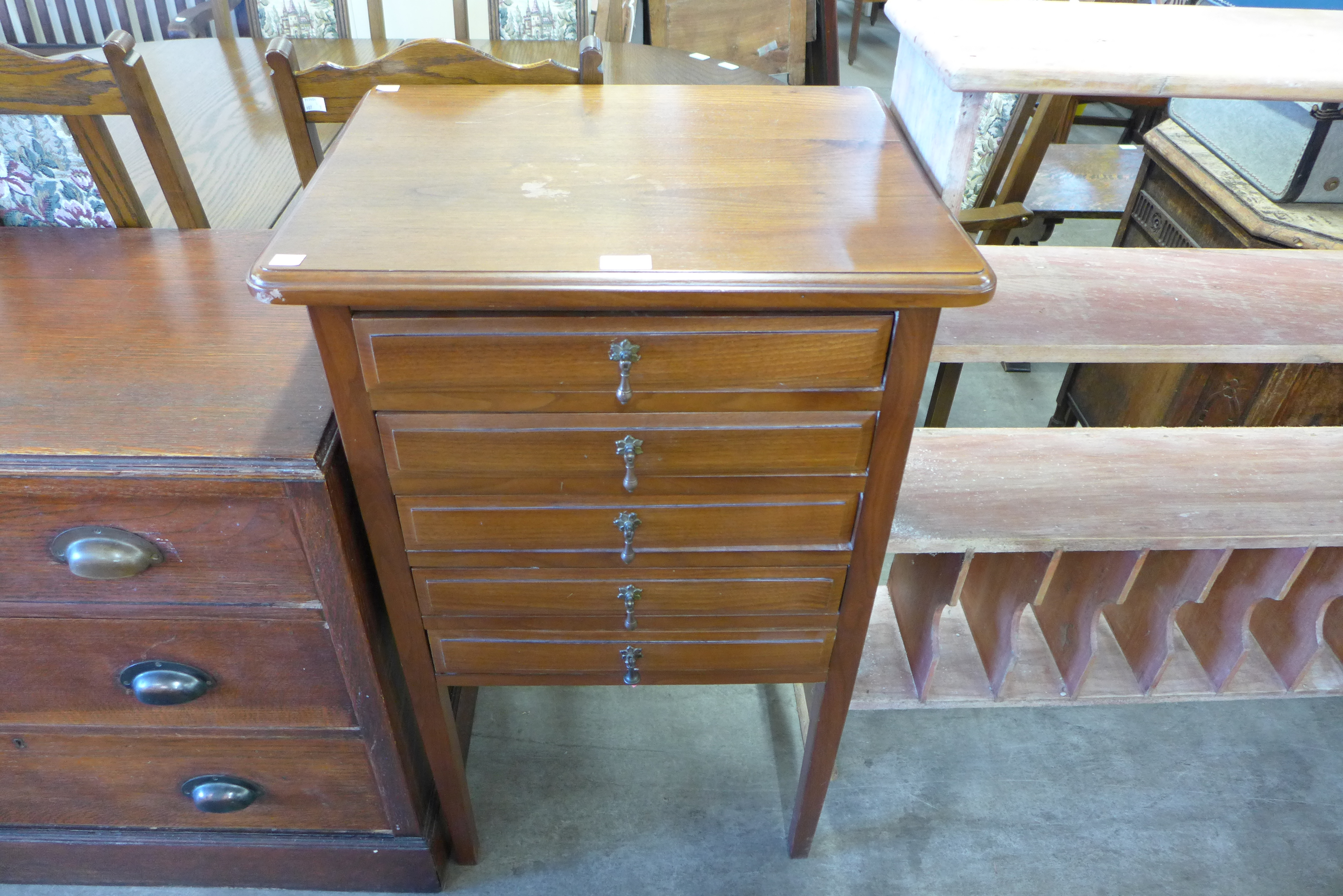 A mahogany five drawer chest