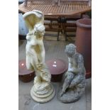 Two concrete garden figures of female nudes bathing