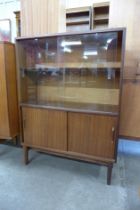 A Beaver and Tapley teak bookcase