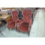 A pair of Victorian mahogany and upholstered armchairs