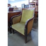 An Art Deco mahogany and upholstered tub chair