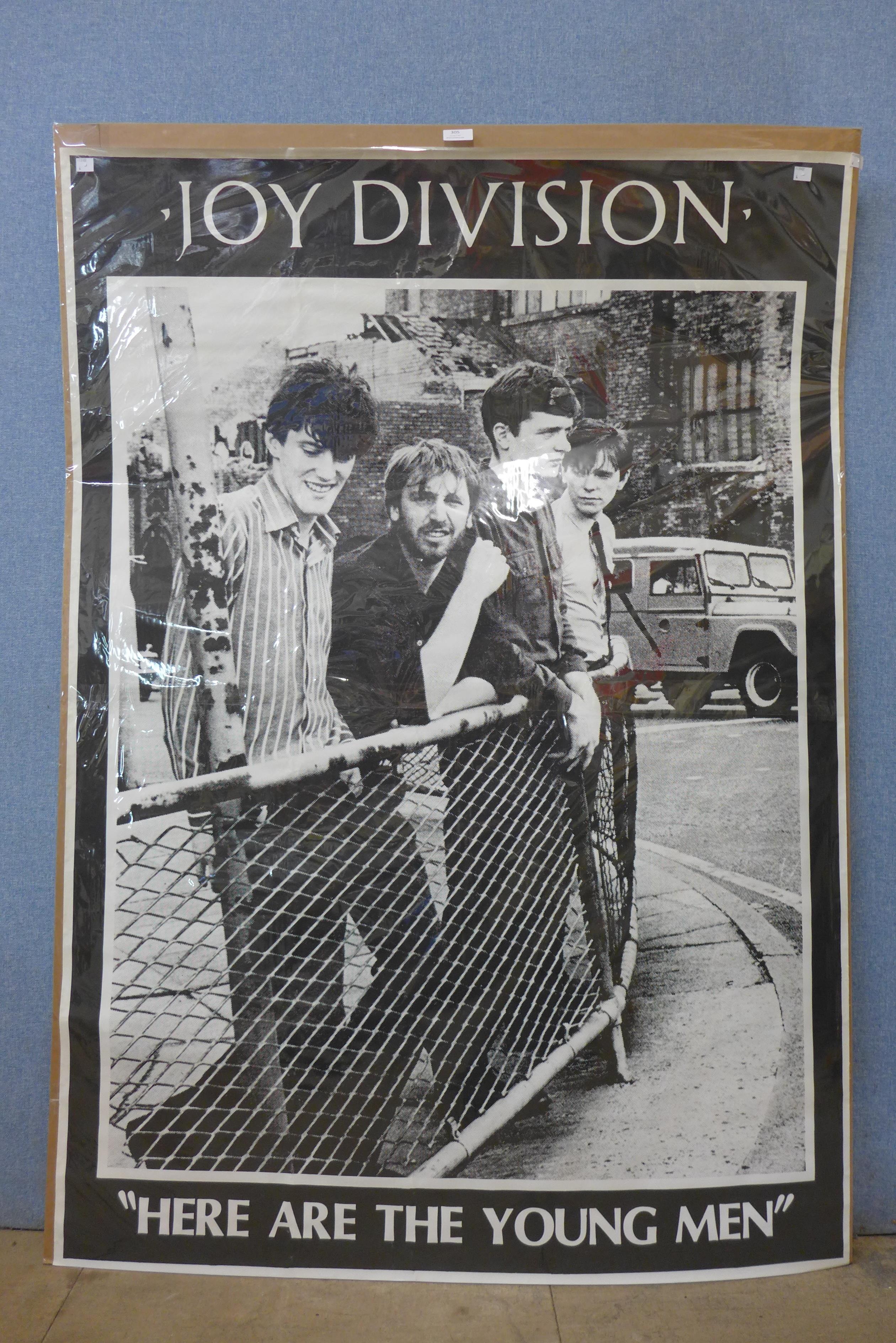 A large Joy Division poster