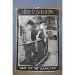 A large Joy Division poster
