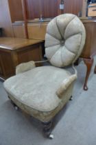 A Victorian mahogany and fabric upholstered cameo back lady's chair