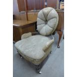 A Victorian mahogany and fabric upholstered cameo back lady's chair