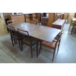 A Richard Hornby afromosia extending dining table and six chairs