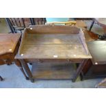 An early 20th century stained pine wash stand