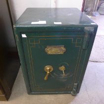 A 19th Century Empire Safe Company cast iron fitted safe with key