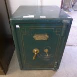 A 19th Century Empire Safe Company cast iron fitted safe with key